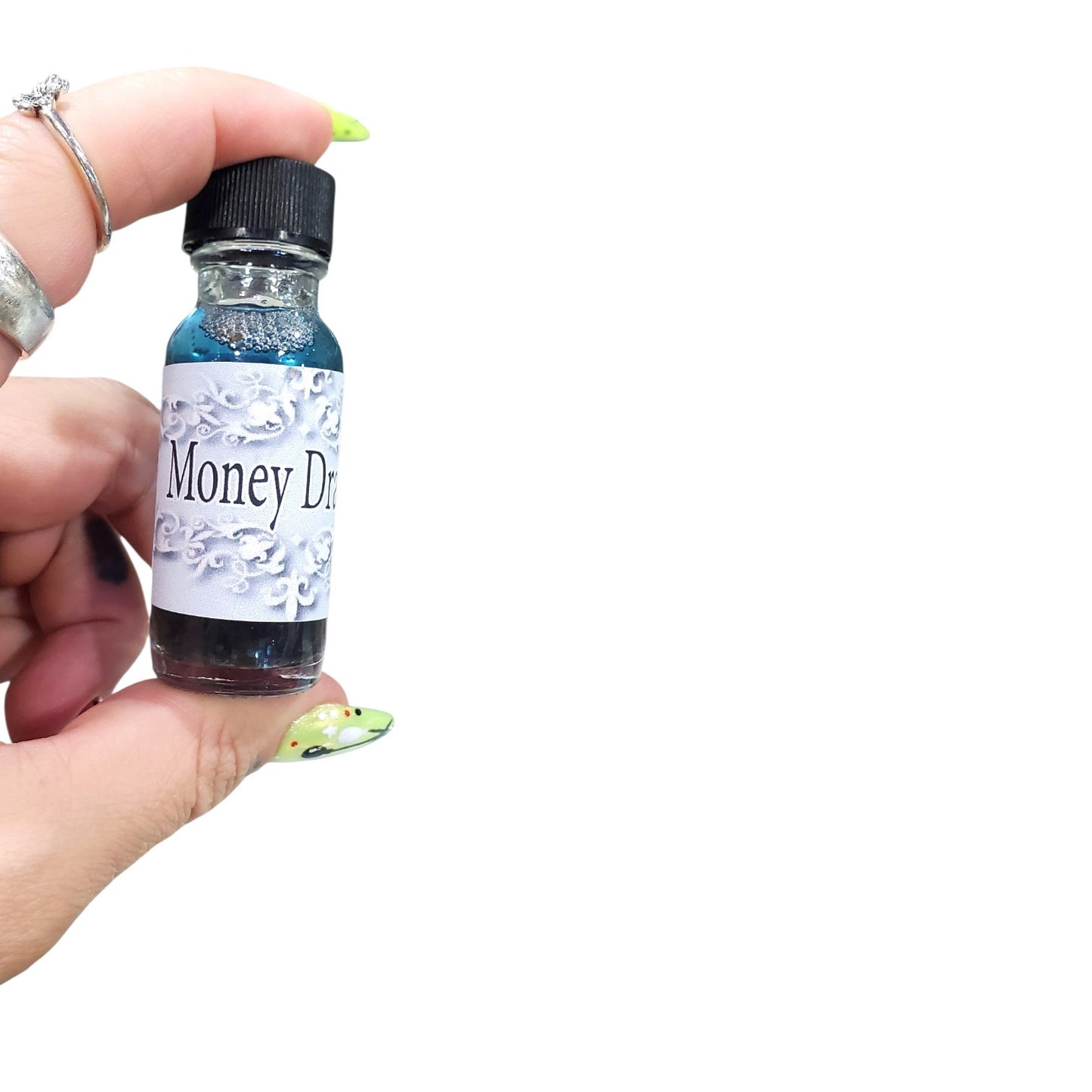 Money Drawing Herbal Oil